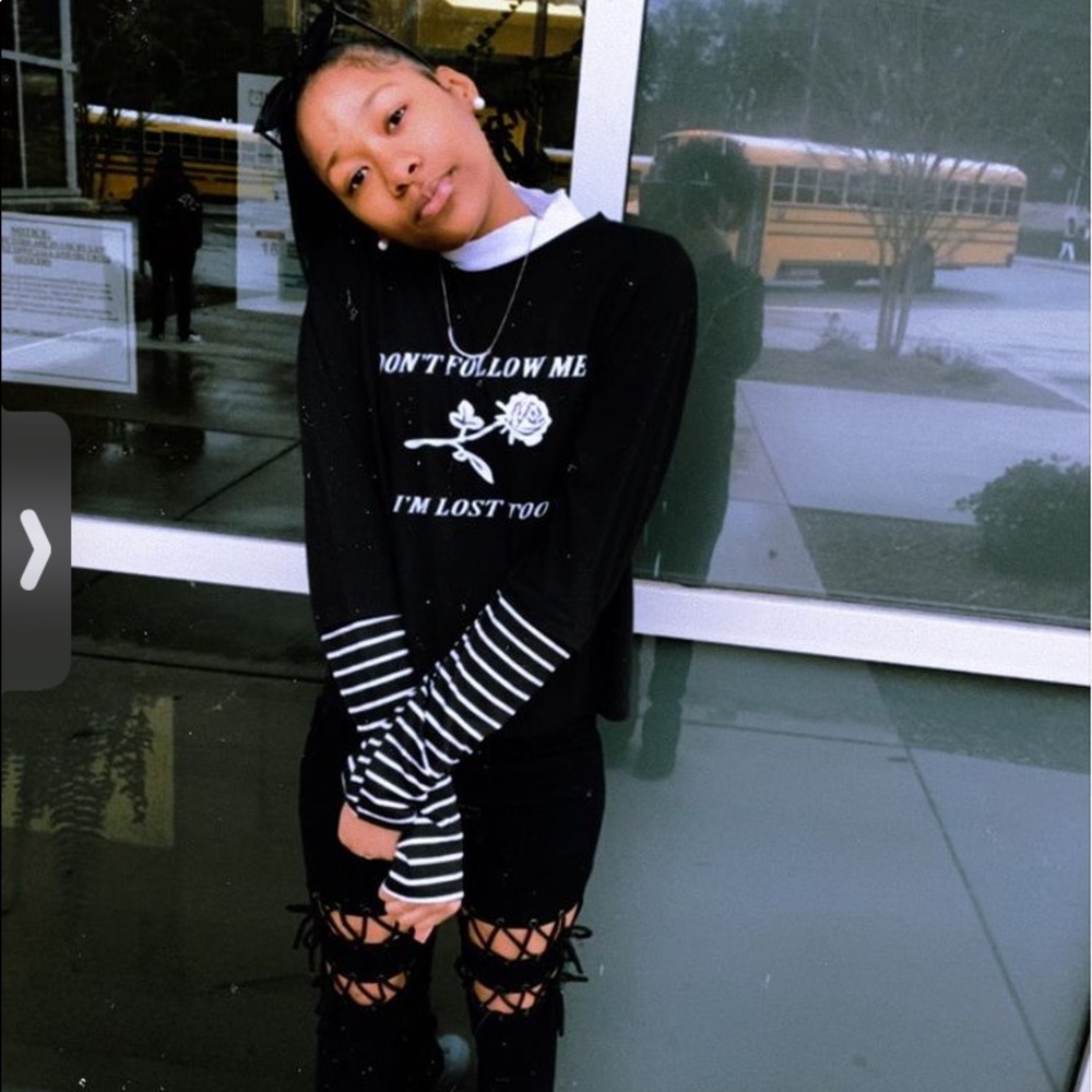 black graphic tee with striped sleeves